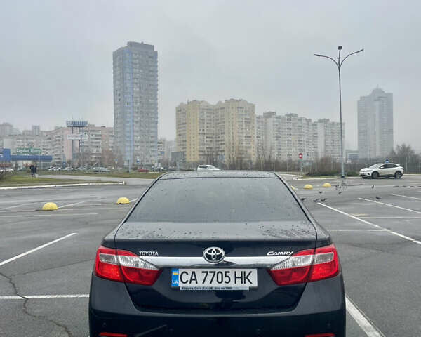 Черный Тойота Камри, объемом двигателя 2.49 л и пробегом 202 тыс. км за 12400 $, фото 5 на Automoto.ua