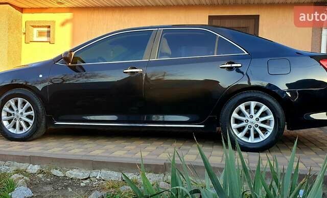 Черный Тойота Камри, объемом двигателя 2.5 л и пробегом 154 тыс. км за 9490 $, фото 44 на Automoto.ua