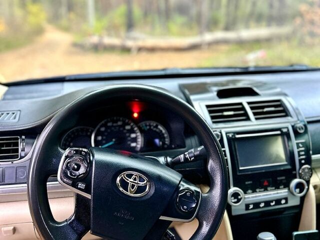 Черный Тойота Камри, объемом двигателя 2.5 л и пробегом 210 тыс. км за 10000 $, фото 6 на Automoto.ua