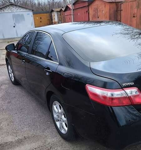 Черный Тойота Камри, объемом двигателя 2.36 л и пробегом 248 тыс. км за 10100 $, фото 1 на Automoto.ua