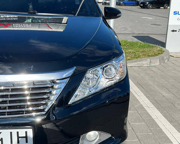 Чорний Тойота Камрі, об'ємом двигуна 2.5 л та пробігом 192 тис. км за 11000 $, фото 1 на Automoto.ua