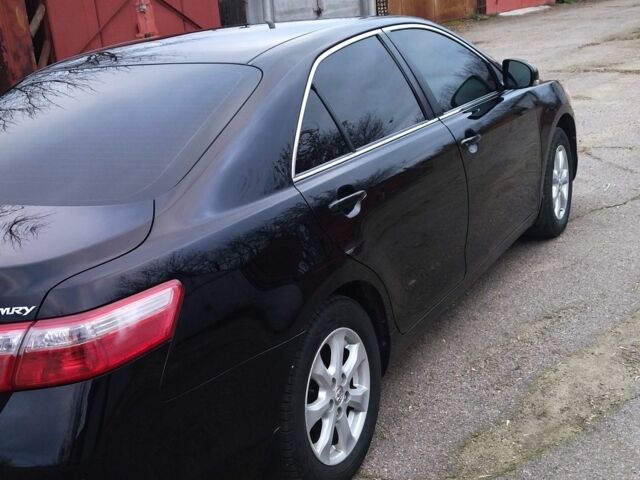 Чорний Тойота Камрі, об'ємом двигуна 2.4 л та пробігом 248 тис. км за 10100 $, фото 2 на Automoto.ua