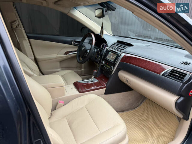 Чорний Тойота Камрі, об'ємом двигуна 2.49 л та пробігом 290 тис. км за 9700 $, фото 9 на Automoto.ua