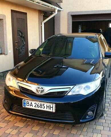 Черный Тойота Камри, объемом двигателя 2.5 л и пробегом 154 тыс. км за 9490 $, фото 41 на Automoto.ua