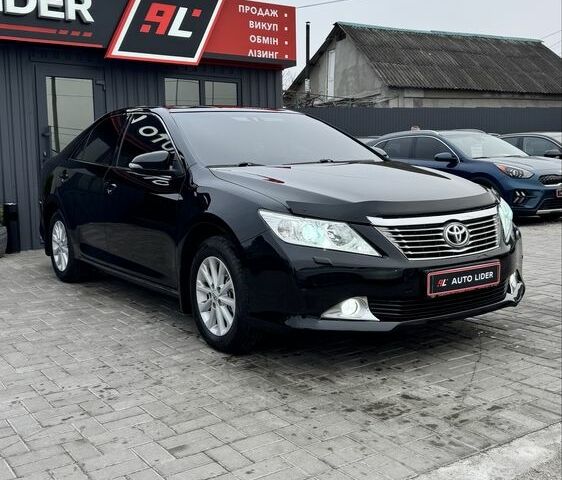 Чорний Тойота Камрі, об'ємом двигуна 2.5 л та пробігом 198 тис. км за 12900 $, фото 1 на Automoto.ua
