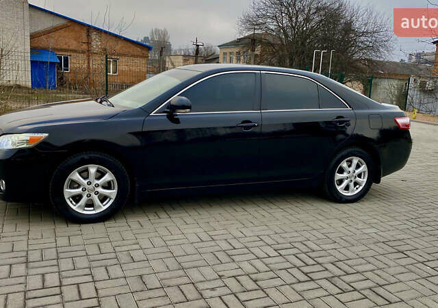 Черный Тойота Камри, объемом двигателя 2.4 л и пробегом 315 тыс. км за 9799 $, фото 8 на Automoto.ua