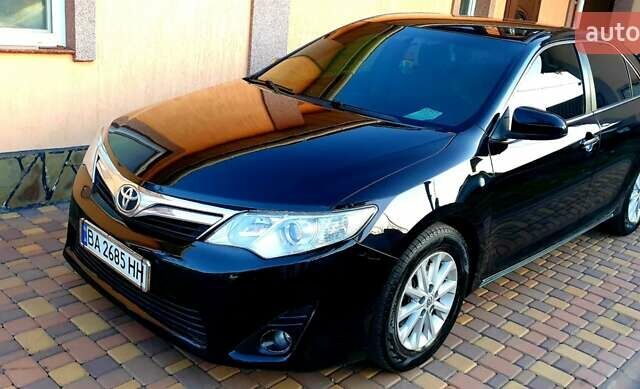 Черный Тойота Камри, объемом двигателя 2.5 л и пробегом 154 тыс. км за 9490 $, фото 2 на Automoto.ua