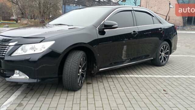 Черный Тойота Камри, объемом двигателя 2.5 л и пробегом 187 тыс. км за 11000 $, фото 9 на Automoto.ua