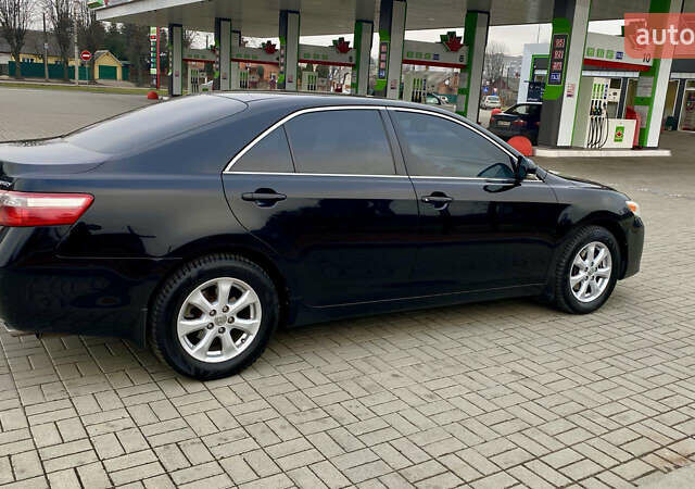 Черный Тойота Камри, объемом двигателя 2.4 л и пробегом 315 тыс. км за 9799 $, фото 6 на Automoto.ua