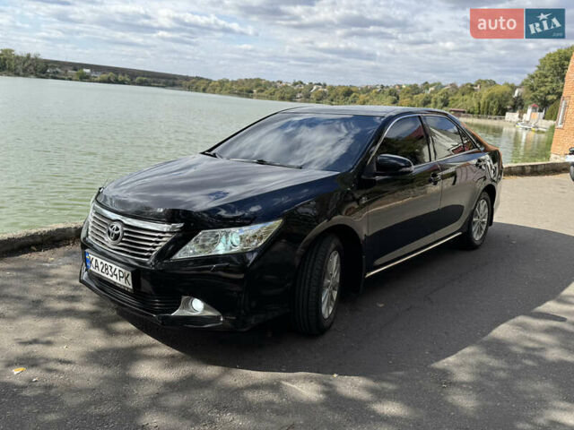 Черный Тойота Камри, объемом двигателя 2.49 л и пробегом 210 тыс. км за 13500 $, фото 2 на Automoto.ua