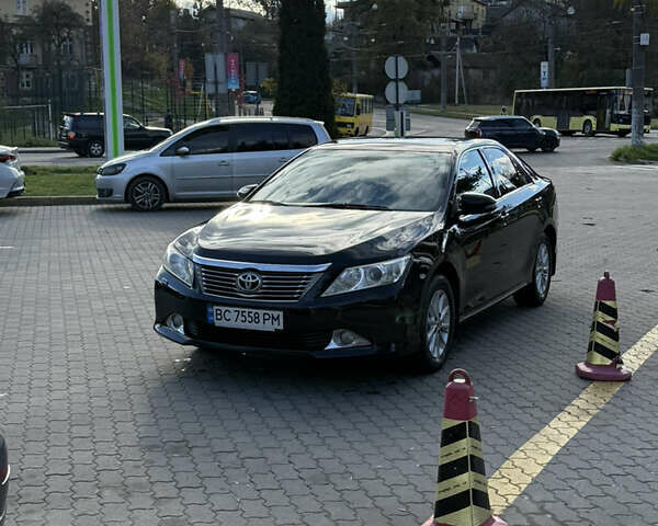 Чорний Тойота Камрі, об'ємом двигуна 2.5 л та пробігом 233 тис. км за 13500 $, фото 9 на Automoto.ua
