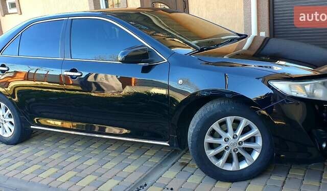 Черный Тойота Камри, объемом двигателя 2.5 л и пробегом 154 тыс. км за 9490 $, фото 6 на Automoto.ua