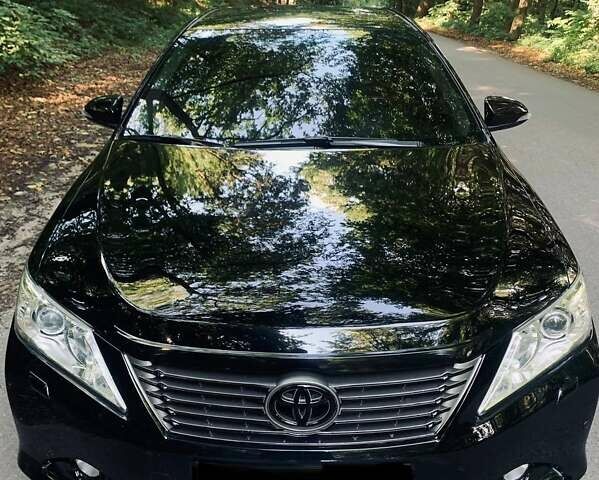 Черный Тойота Камри, объемом двигателя 2.5 л и пробегом 250 тыс. км за 13000 $, фото 33 на Automoto.ua