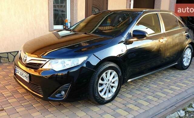 Черный Тойота Камри, объемом двигателя 2.5 л и пробегом 154 тыс. км за 9490 $, фото 45 на Automoto.ua