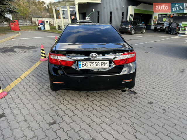 Чорний Тойота Камрі, об'ємом двигуна 2.5 л та пробігом 233 тис. км за 13500 $, фото 10 на Automoto.ua