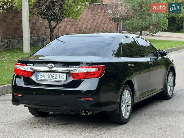 Черный Тойота Камри, объемом двигателя 2.5 л и пробегом 198 тыс. км за 12950 $, фото 6 на Automoto.ua