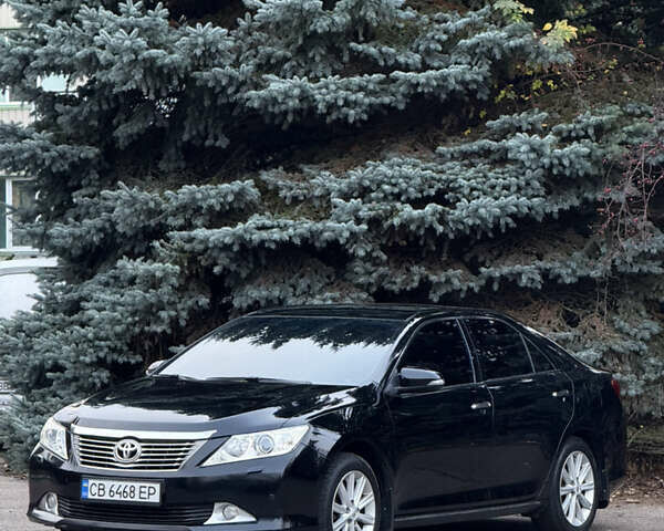 Чорний Тойота Камрі, об'ємом двигуна 2.49 л та пробігом 215 тис. км за 14500 $, фото 2 на Automoto.ua
