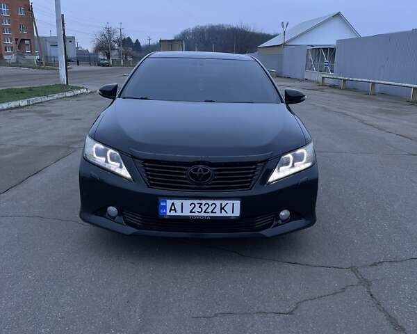 Черный Тойота Камри, объемом двигателя 2.5 л и пробегом 203 тыс. км за 13500 $, фото 2 на Automoto.ua