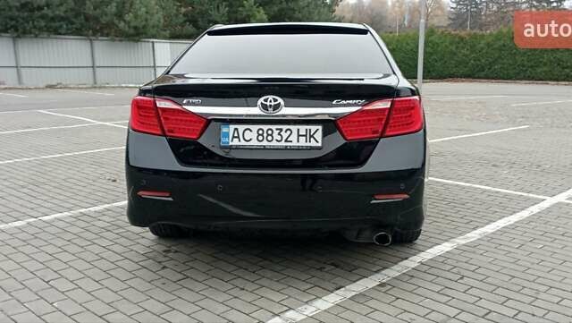 Черный Тойота Камри, объемом двигателя 2.5 л и пробегом 187 тыс. км за 11000 $, фото 6 на Automoto.ua
