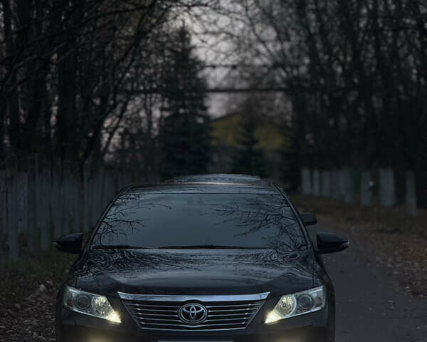 Чорний Тойота Камрі, об'ємом двигуна 2.49 л та пробігом 215 тис. км за 14500 $, фото 8 на Automoto.ua