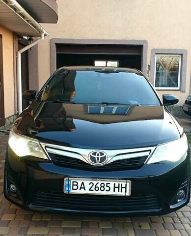 Черный Тойота Камри, объемом двигателя 2.5 л и пробегом 154 тыс. км за 9490 $, фото 24 на Automoto.ua