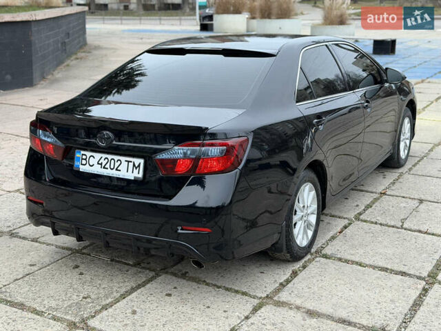 Черный Тойота Камри, объемом двигателя 2.5 л и пробегом 280 тыс. км за 9900 $, фото 10 на Automoto.ua