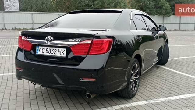 Черный Тойота Камри, объемом двигателя 2.5 л и пробегом 187 тыс. км за 11000 $, фото 5 на Automoto.ua