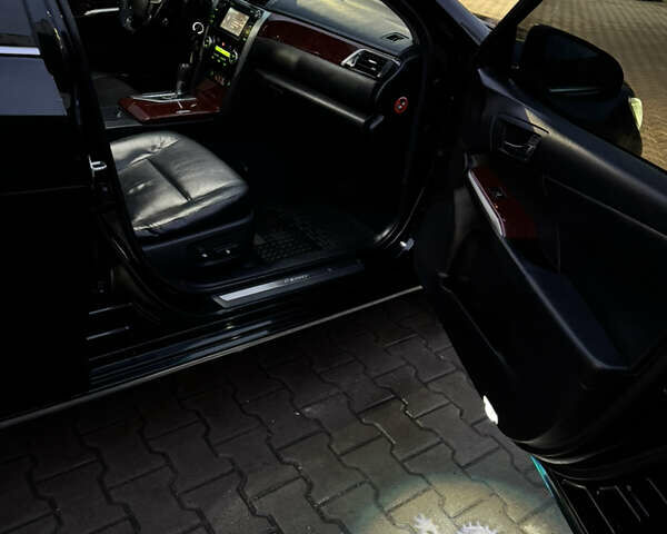 Черный Тойота Камри, объемом двигателя 2.5 л и пробегом 190 тыс. км за 13000 $, фото 11 на Automoto.ua