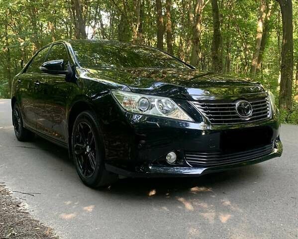 Черный Тойота Камри, объемом двигателя 2.5 л и пробегом 250 тыс. км за 13000 $, фото 28 на Automoto.ua