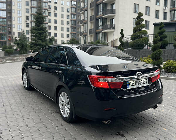 Черный Тойота Камри, объемом двигателя 3.46 л и пробегом 217 тыс. км за 13500 $, фото 14 на Automoto.ua