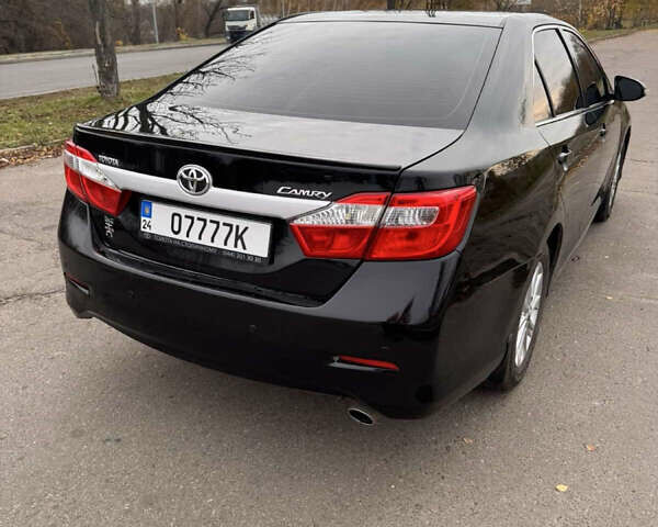 Чорний Тойота Камрі, об'ємом двигуна 2.49 л та пробігом 236 тис. км за 11000 $, фото 3 на Automoto.ua