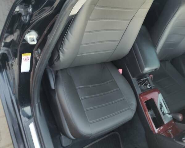 Черный Тойота Камри, объемом двигателя 2.5 л и пробегом 294 тыс. км за 12000 $, фото 7 на Automoto.ua