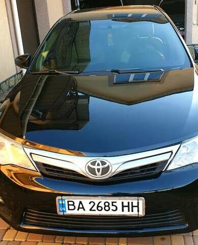 Черный Тойота Камри, объемом двигателя 2.5 л и пробегом 154 тыс. км за 9490 $, фото 40 на Automoto.ua