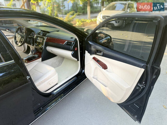 Чорний Тойота Камрі, об'ємом двигуна 2.49 л та пробігом 208 тис. км за 13500 $, фото 1 на Automoto.ua