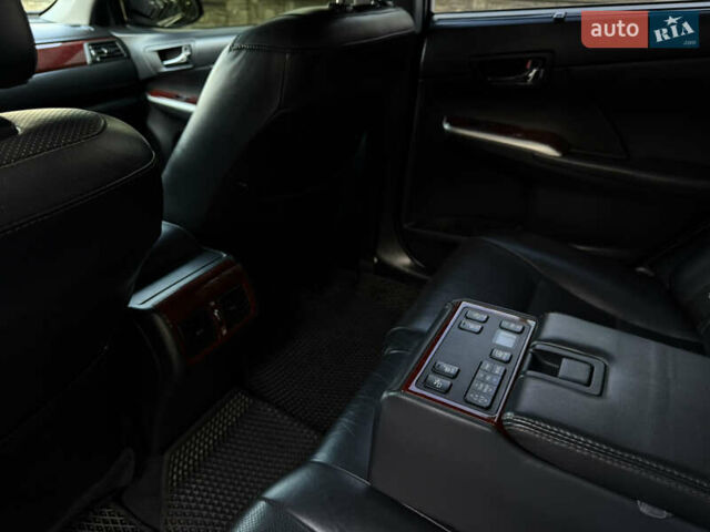 Чорний Тойота Камрі, об'ємом двигуна 3.46 л та пробігом 210 тис. км за 13500 $, фото 6 на Automoto.ua