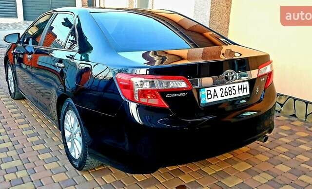 Черный Тойота Камри, объемом двигателя 2.5 л и пробегом 154 тыс. км за 9490 $, фото 10 на Automoto.ua