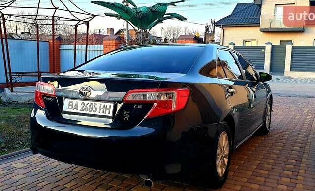 Черный Тойота Камри, объемом двигателя 2.5 л и пробегом 154 тыс. км за 9490 $, фото 14 на Automoto.ua