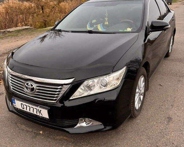Чорний Тойота Камрі, об'ємом двигуна 2.49 л та пробігом 236 тис. км за 11000 $, фото 1 на Automoto.ua