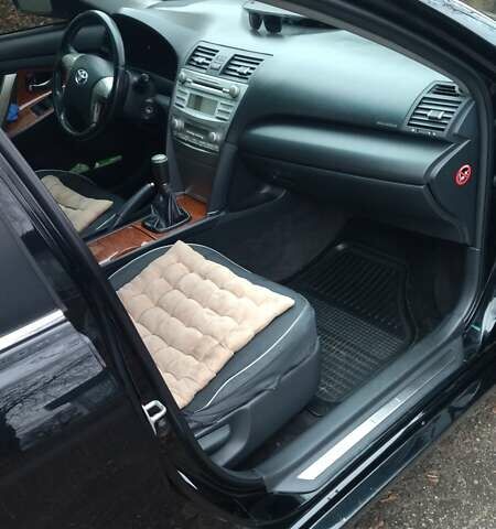 Черный Тойота Камри, объемом двигателя 2.36 л и пробегом 248 тыс. км за 10500 $, фото 11 на Automoto.ua