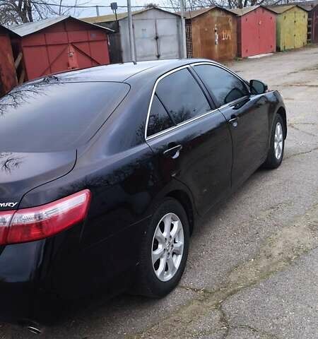 Черный Тойота Камри, объемом двигателя 2.36 л и пробегом 248 тыс. км за 10100 $, фото 7 на Automoto.ua