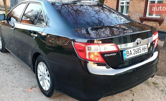 Черный Тойота Камри, объемом двигателя 2.5 л и пробегом 154 тыс. км за 9490 $, фото 18 на Automoto.ua