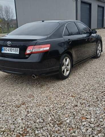 Черный Тойота Камри, объемом двигателя 2.5 л и пробегом 260 тыс. км за 10200 $, фото 1 на Automoto.ua