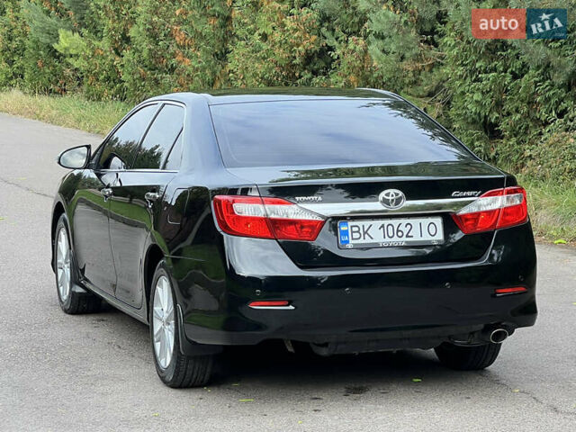 Черный Тойота Камри, объемом двигателя 2.5 л и пробегом 198 тыс. км за 12950 $, фото 7 на Automoto.ua