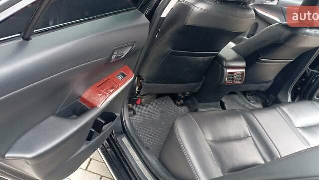 Черный Тойота Камри, объемом двигателя 2.5 л и пробегом 187 тыс. км за 11000 $, фото 12 на Automoto.ua