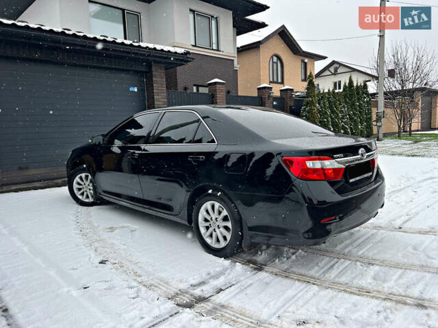 Черный Тойота Камри, объемом двигателя 2.5 л и пробегом 195 тыс. км за 13850 $, фото 80 на Automoto.ua