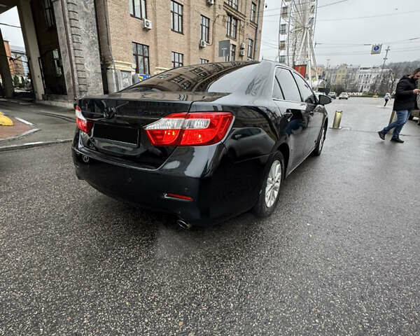 Черный Тойота Камри, объемом двигателя 2.5 л и пробегом 280 тыс. км за 10999 $, фото 6 на Automoto.ua