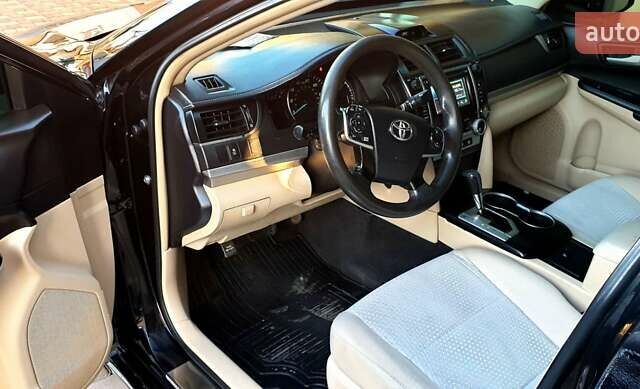 Черный Тойота Камри, объемом двигателя 2.5 л и пробегом 154 тыс. км за 9490 $, фото 33 на Automoto.ua