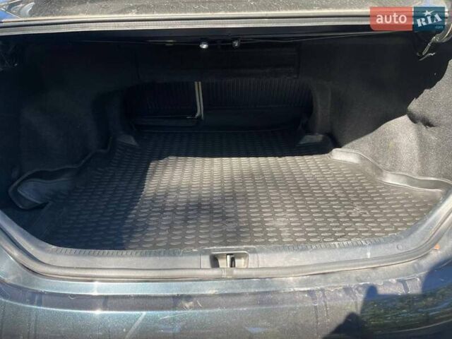 Черный Тойота Камри, объемом двигателя 2.5 л и пробегом 188 тыс. км за 10800 $, фото 7 на Automoto.ua