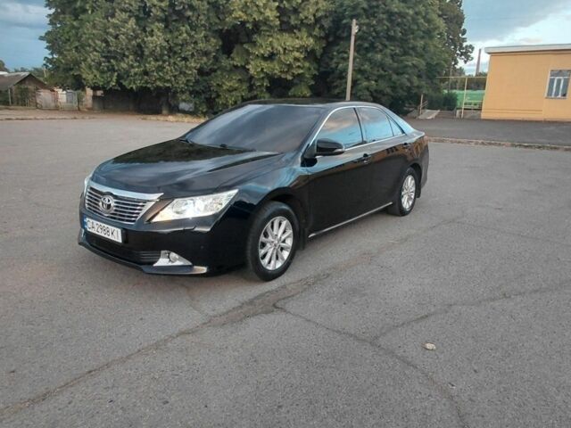 Черный Тойота Камри, объемом двигателя 2.5 л и пробегом 263 тыс. км за 13200 $, фото 4 на Automoto.ua