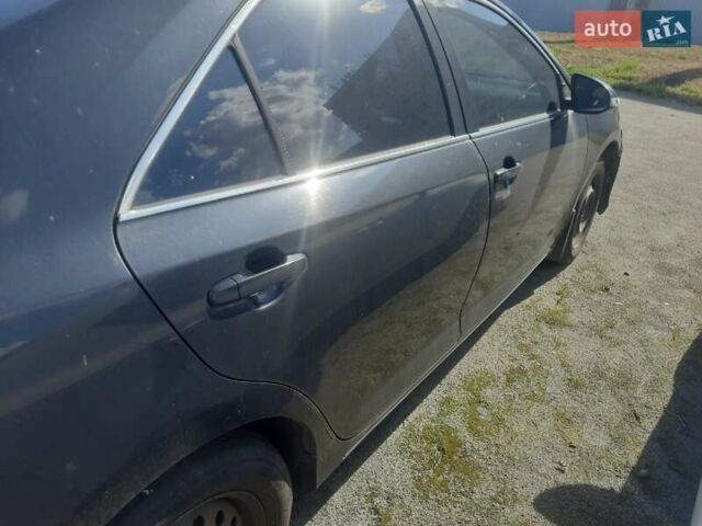 Черный Тойота Камри, объемом двигателя 2.5 л и пробегом 646 тыс. км за 10794 $, фото 4 на Automoto.ua